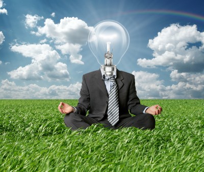 inspiration-meditating-businessman-lightbulb